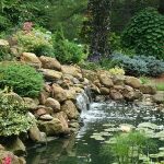 Cincinnati landscape design with balanced plant and hardscape elements for home